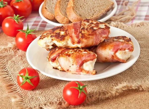 Grilled chicken patties wrapped strips of bacon — Stock Photo, Image