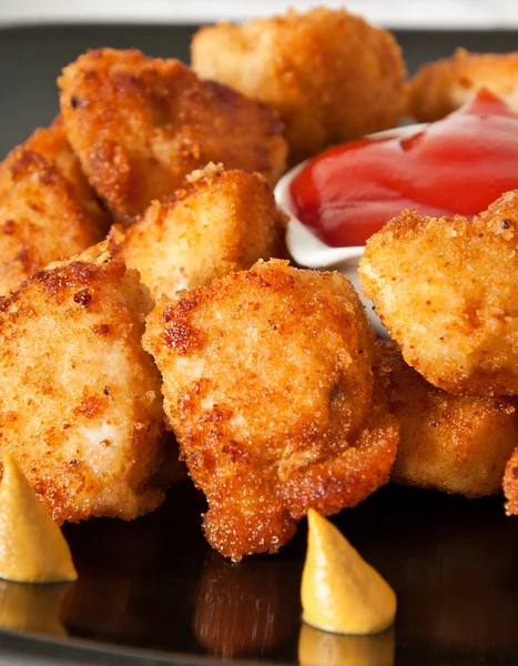 Fresh fragrant fried chicken nuggets — Stock Photo, Image