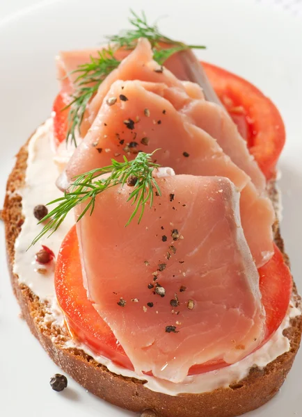 Appetizing sandwich with salmon — Stock Photo, Image