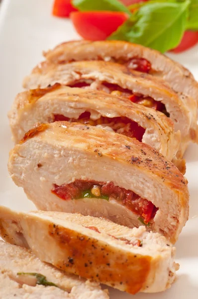 Grilled chicken breast stuffed with basil, tomato and garlic — Stock Photo, Image