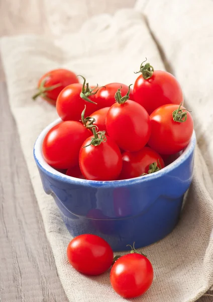 Cherry tomatoes in a bowl — Stock Photo, Image