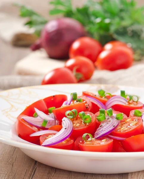 Tomato cherry salad with black pepper and onion — Stock Photo, Image