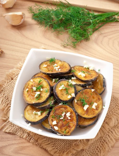 Platter of grilled eggplant with garlic and dill — Stock Photo, Image