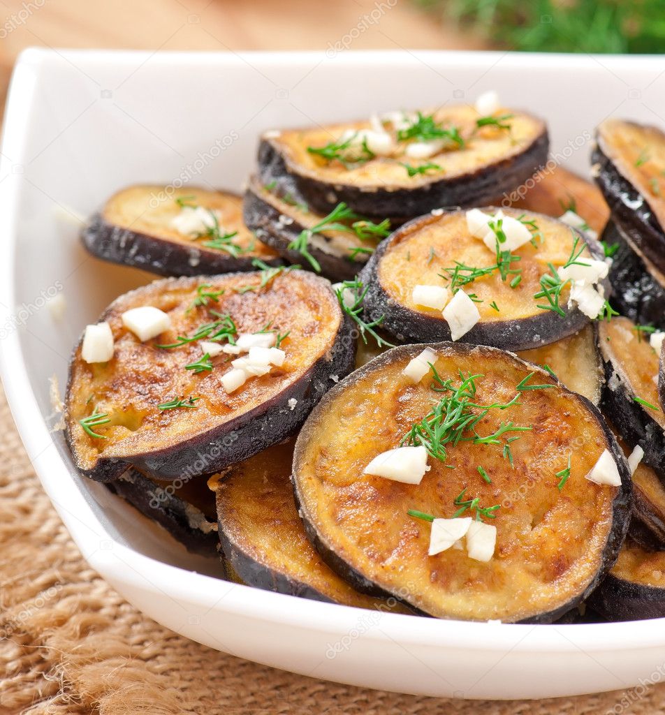 Platter of grilled eggplant with garlic and dill