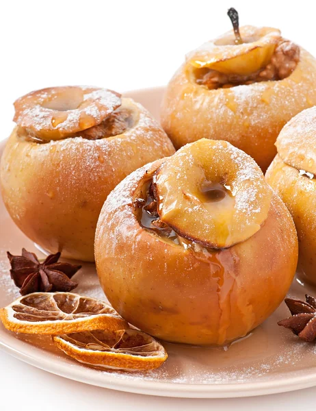 Baked apples with honey and nuts — Stock Photo, Image