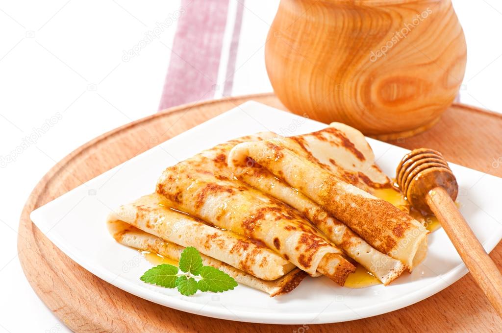 Delicious pancakes with honey