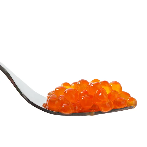 Caviar rojo sobre un tenedor aislado sobre fondo blanco —  Fotos de Stock