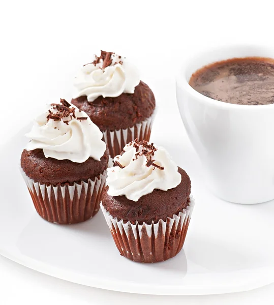 Muffins de chocolate e xícara de café — Fotografia de Stock