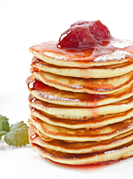 Delicious pancakes with strawberry jam