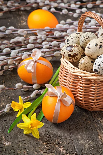 Colorful easter eggs on old wooden background — Stock Photo, Image