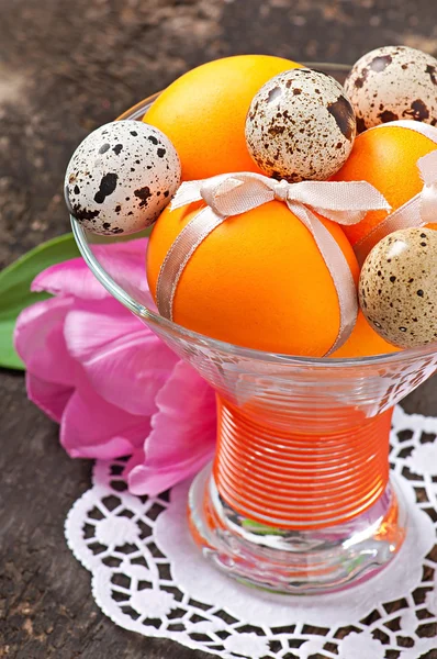 Colorful easter eggs on old wooden background — Stock Photo, Image