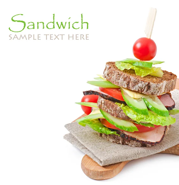 Sandwich with ham and fresh vegetables on white background — Stock Photo, Image