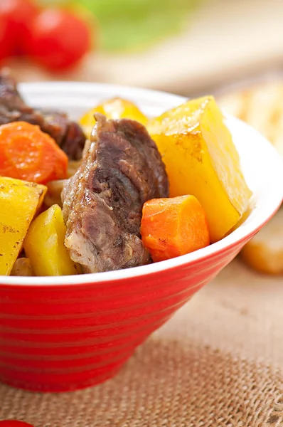 Baked potato with meat — Stock Photo, Image