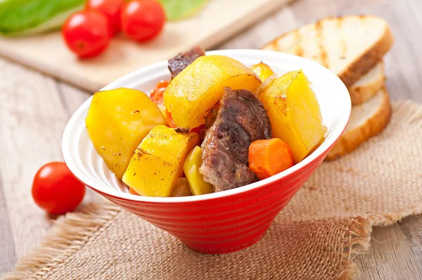 Baked potato with meat — Stock Photo, Image