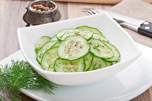 Fresh salad of cucumbers with dill and pepper — Stock Photo, Image