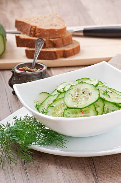 Fresh salad of cucumbers with dill and pepper — Stock Photo, Image