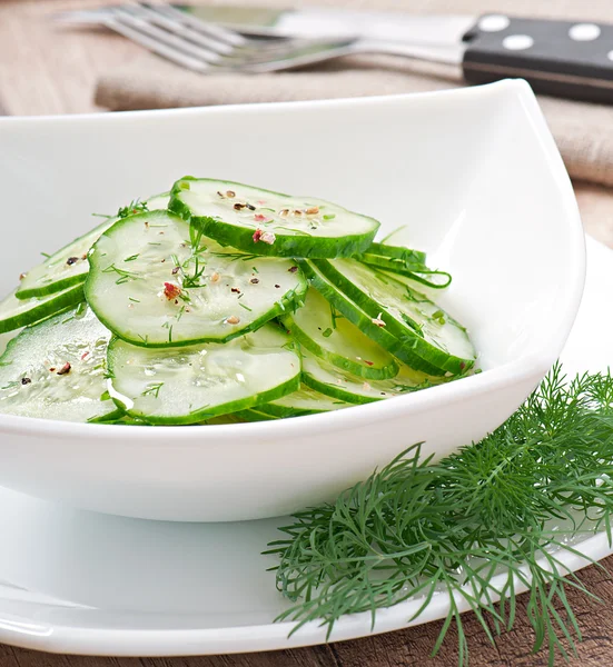 Fresh salad of cucumbers with dill and pepper — Stock Photo, Image