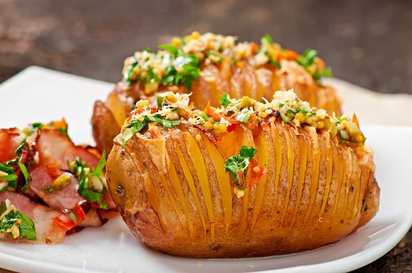 Baked potato with cheese and butter — Stock Photo, Image