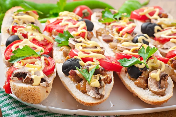 Baguette stuffed with veal and mushrooms — Stock Photo, Image