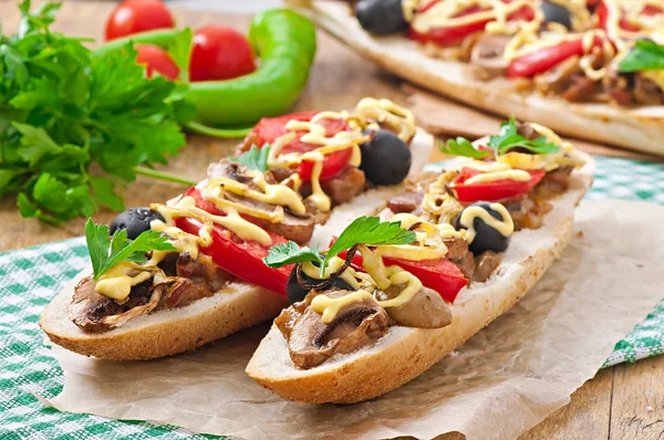 Baguette with veal and mushrooms — Stock Photo, Image