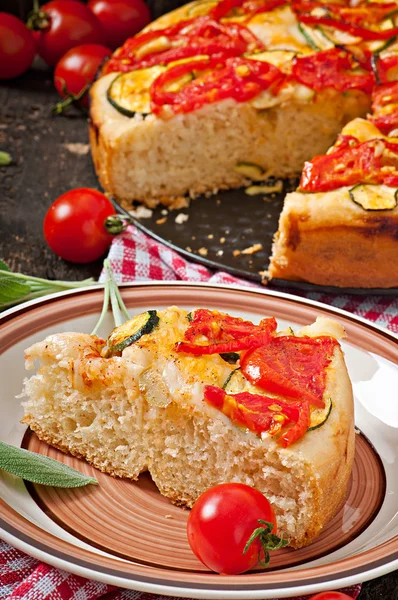 Focaccia with tomatoes and garlic — Stock Photo, Image