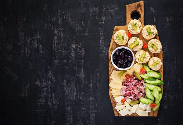 Antipasto Catering Platter Jamon Cheese Canape Black Olives Wooden Board — Stock Photo, Image