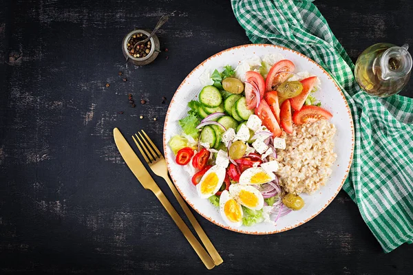 Breakfast Oatmeal Porridge Greek Salad Tomatoes Cucumbers Olives Feta Cheese — Stock Photo, Image