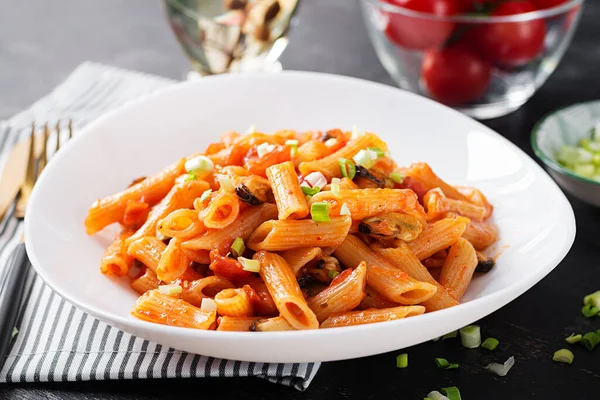 Classic Italian Pasta Penne Marinara Mussels Green Onions Dark Table — Stockfoto