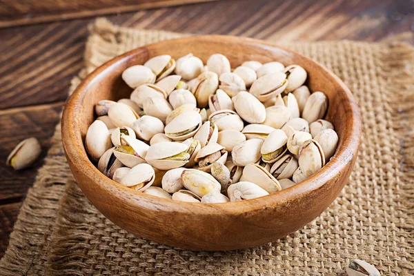 Pistachio Nuts Shell Bowl Wooden Background — Fotografia de Stock