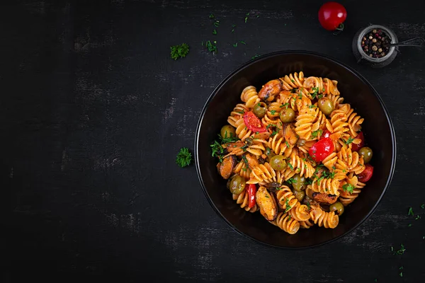 Classic Italian Pasta Fusilli Marinara Mussels Green Olives Capers Dark — Stockfoto