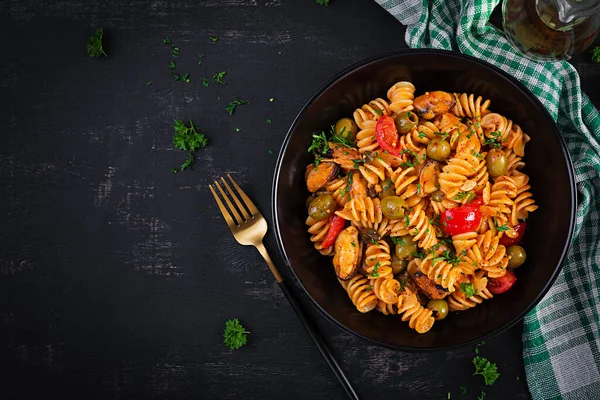 Classic Italian Pasta Fusilli Marinara Mussels Green Olives Capers Dark — ストック写真