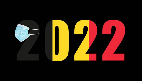 ベルギーの国旗は 2022年の数字を背景にコヴィトからのマスク — ストック写真