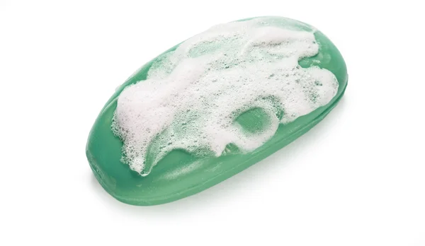 Green soap with white suds — Stock Photo, Image