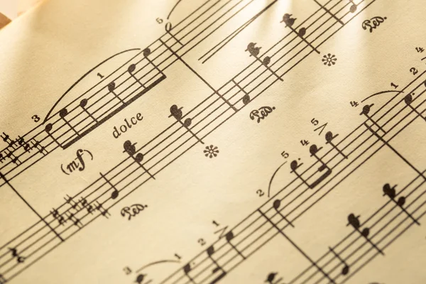 Music notes on paper background Stock Photo by ©Garsya 92541706