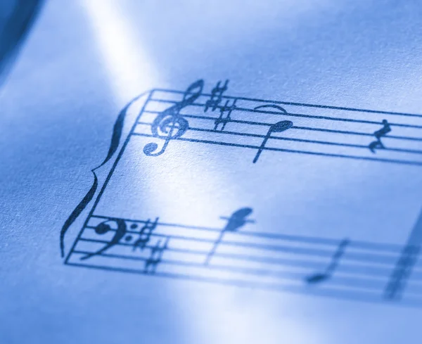 Muziek notities op papier achtergrond — Stockfoto