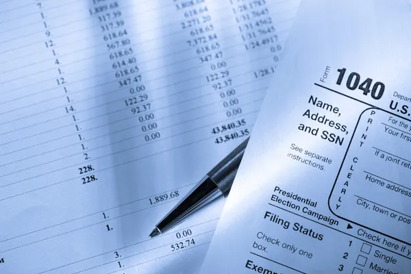 Tax form, operating budget and pen — Stock Photo, Image