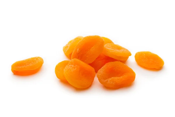 Сушені абрикоси на білому тлі — стокове фото