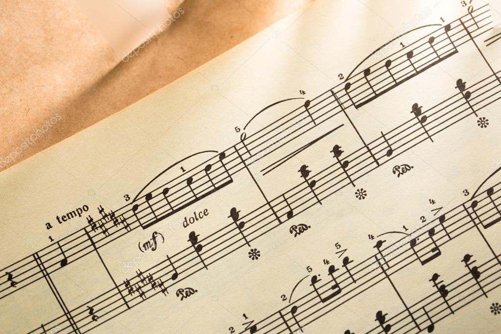 Music notes on paper background Stock Photo by ©Garsya 12292392