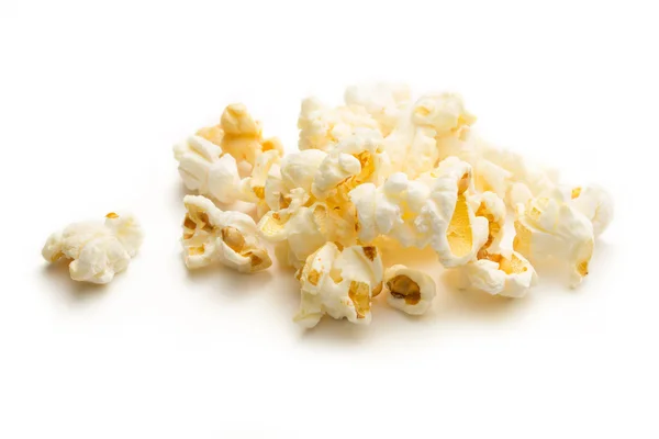 Popcorn auf weißem Hintergrund — Stockfoto