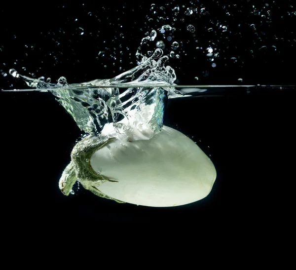 White aubergine in water splash — Stock Photo, Image