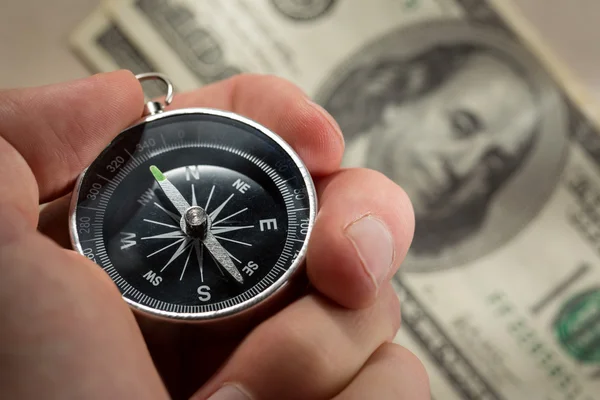 Hand holding silver black compass — Stock Photo, Image