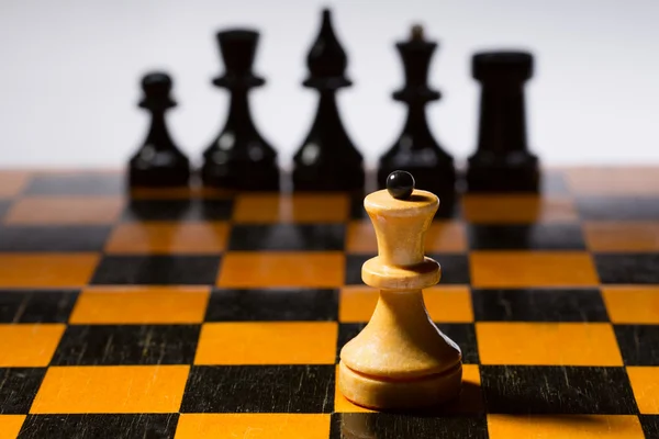 Wooden chessboard with chessmen — Stock Photo, Image