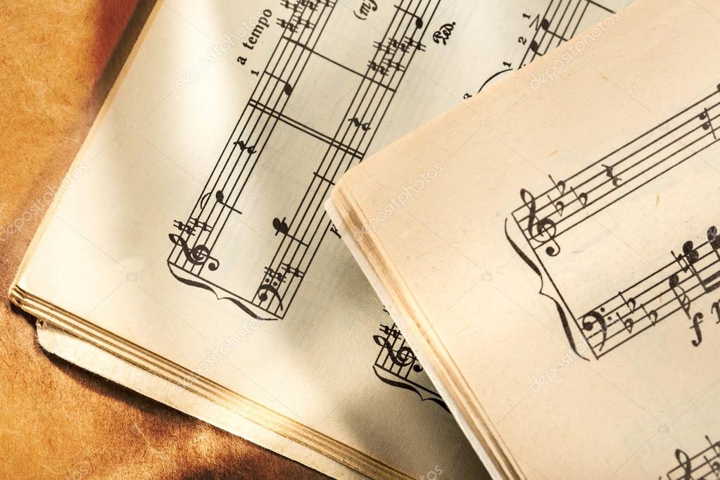 Music notes on paper background Stock Photo by ©Garsya 13131195
