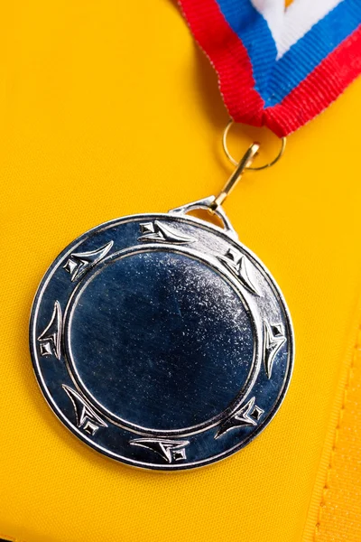 Metal medal with tricolor ribbon — Stock Photo, Image