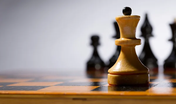 Wooden chessboard with chessmen — Stock Photo, Image