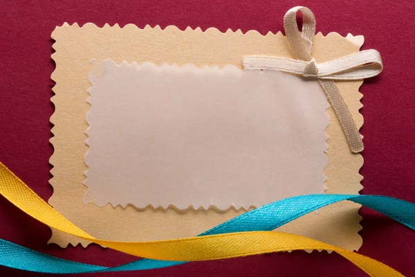 Greeting card with decorative ribbon — Stock Photo, Image