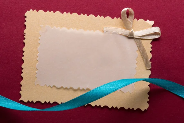 Greeting card with decorative ribbon — Stock Photo, Image