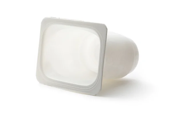 Empty plastic yoghurt pot on white — Stock Photo, Image