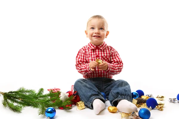 Kind met fir tak en Kerstmis decoratie — Stockfoto