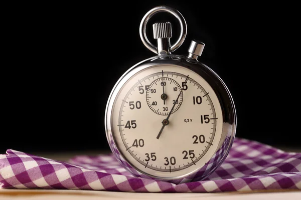 Stopwatch closeup on black background — Stock Photo, Image